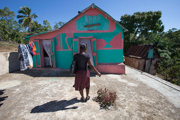 Yolande Gabriel pays a visit to the home of expectant mother Dieula Alrich near Mizak, Haiti.