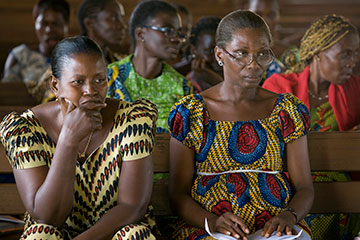 Women listen to a public health education lesson on AIDS at Jerusalem Parish United Methodist Church in Yamoussoukro, Côte d'Ivoire, in November 2008.