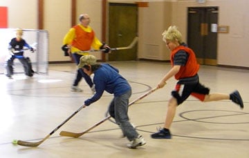 Calvin Cornet (left) guides the puck. A web-only photo courtesy of Ashley Moreland.