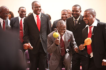 The Men's Association of the United Methodist Church, Harare West District, sings during the Palm Sunday worship at the Kwang Lim Chapel.