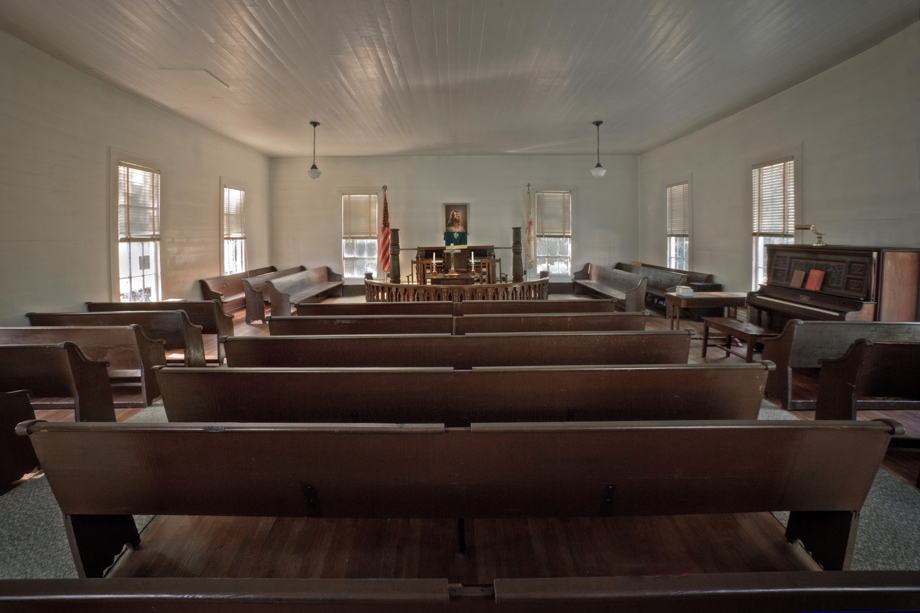 The pews at Union United Methodist Church have mortised notches, from when men sat separately from women and children during worship. Photo by Randall Davis, courtesy Historic Rural Churches of Georgia.