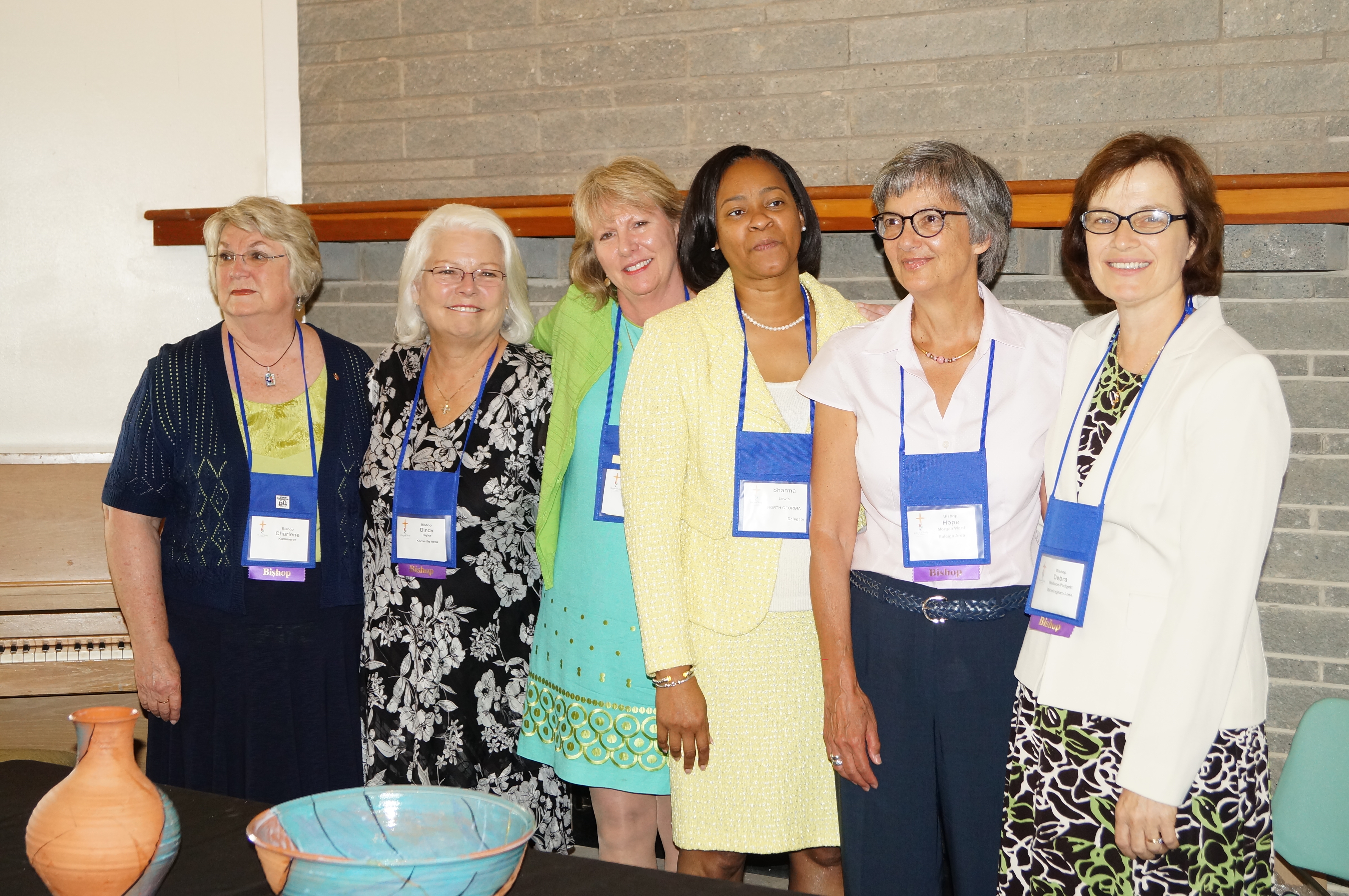 The Southeastern Jurisdiction’s women bishops join in celebration. They are, from left, retired Bishop Charlene Kammerer and active Bishops Mary Virginia “Dindi” Taylor, Sue Haupert-Johnson, Sharma Lewis, Hope Morgan Ward and Debra Wallace-Padgett. Photo by Jasmine Haynes, Mississippi Conference