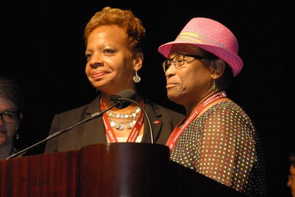 Bishop-elect Tracy Smith Malone, at left, addresses the North Cenrtral Jurisdiction after her election. Photo courtesy of the North Central Jurisdiction