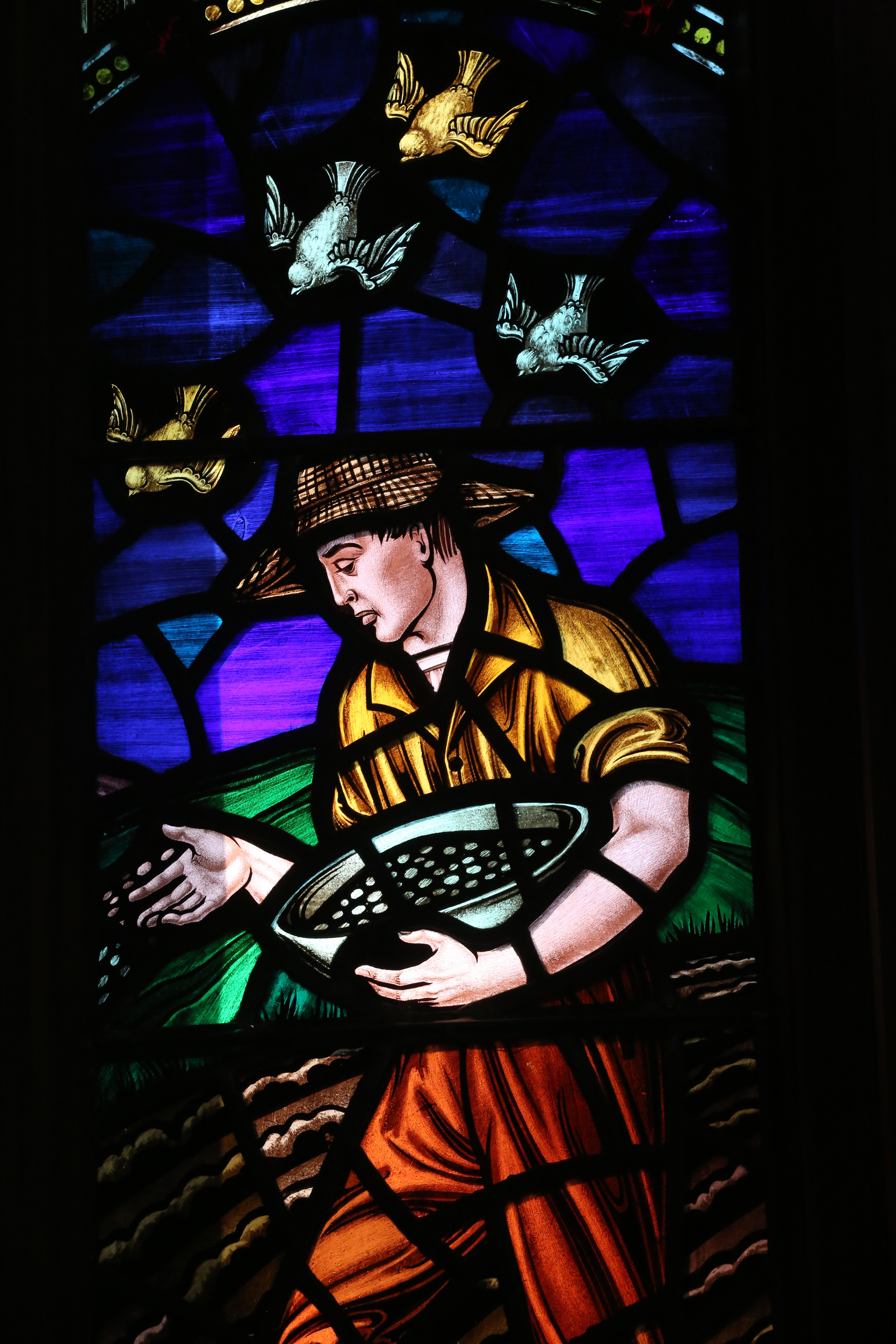 Stained glass featuring a sower of seeds is one of many windows inside Grace United Methodist Church in Atlanta. Photo by Kathleen Barry, United Methodist Communications