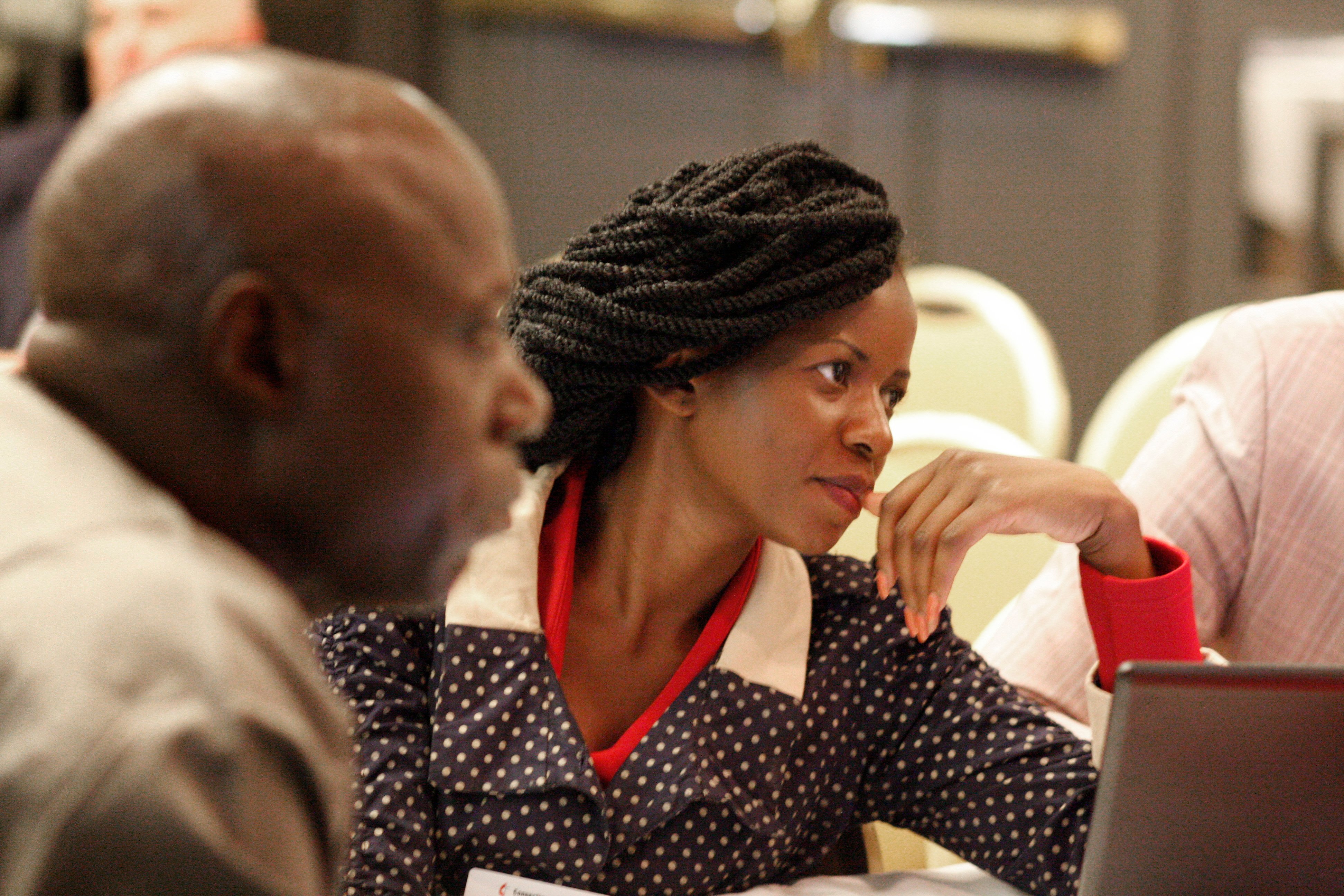 Miracle Osman (center) of the Malawi Provisional Conference takes part in a discussion during the United Methodist Connectional Table meeting in Jacksonville, Fla. Photo by Kathy L. Gilbert, UMNS.