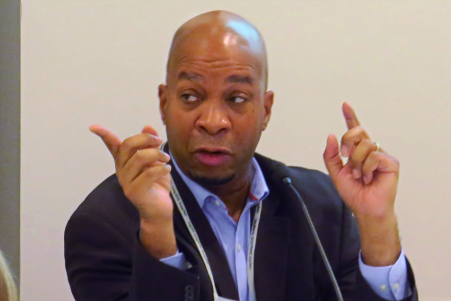 The Rev. Cedric Johnson, assistant professor of pastoral theology and congregational care at Wesley Theological Seminary, was among the panelists at the Nov. 14-16 Faith and Guns Forum, held in Washington by the United Methodist Board of Church and Society. Photo by Sam Hodges, UMNS.