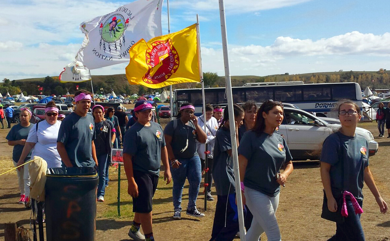 Youth, chaperones and organizers of the Peg-Leg Flamingos conference take in the views during a visit to Standing Rock in North Dakota in September. Photo courtesy of the Rev. Carol Lakota Eastin.