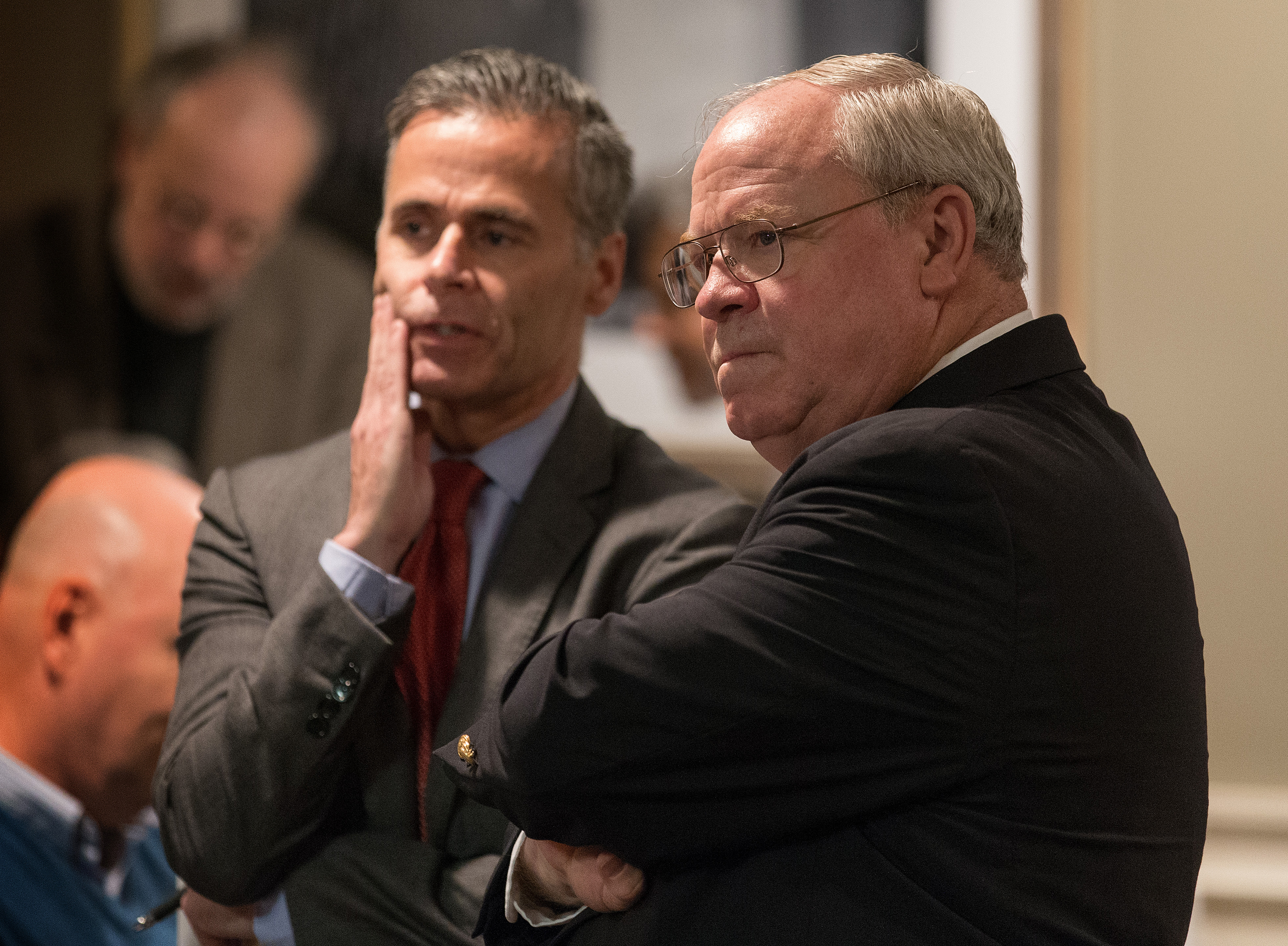 The Revs. Keith Boyette (right) and Walter Fenton confer prior to oral arguments before the United Methodist Judicial Council meeting in Newark, N.J. Boyette represented Dixie Brewster, who questioned whether a gay pastor can serve as a bishop in The United Methodist Church. Fenton is director of development for Good News, an unofficial United Methodist renewal group. Photo by Mike DuBose, UMNS.