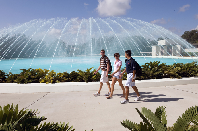 Students walk past a water dome designed by American architect Frank Lloyd Wright on the campus of Florida Southern College. Photo courtesy of Florida Southern College.