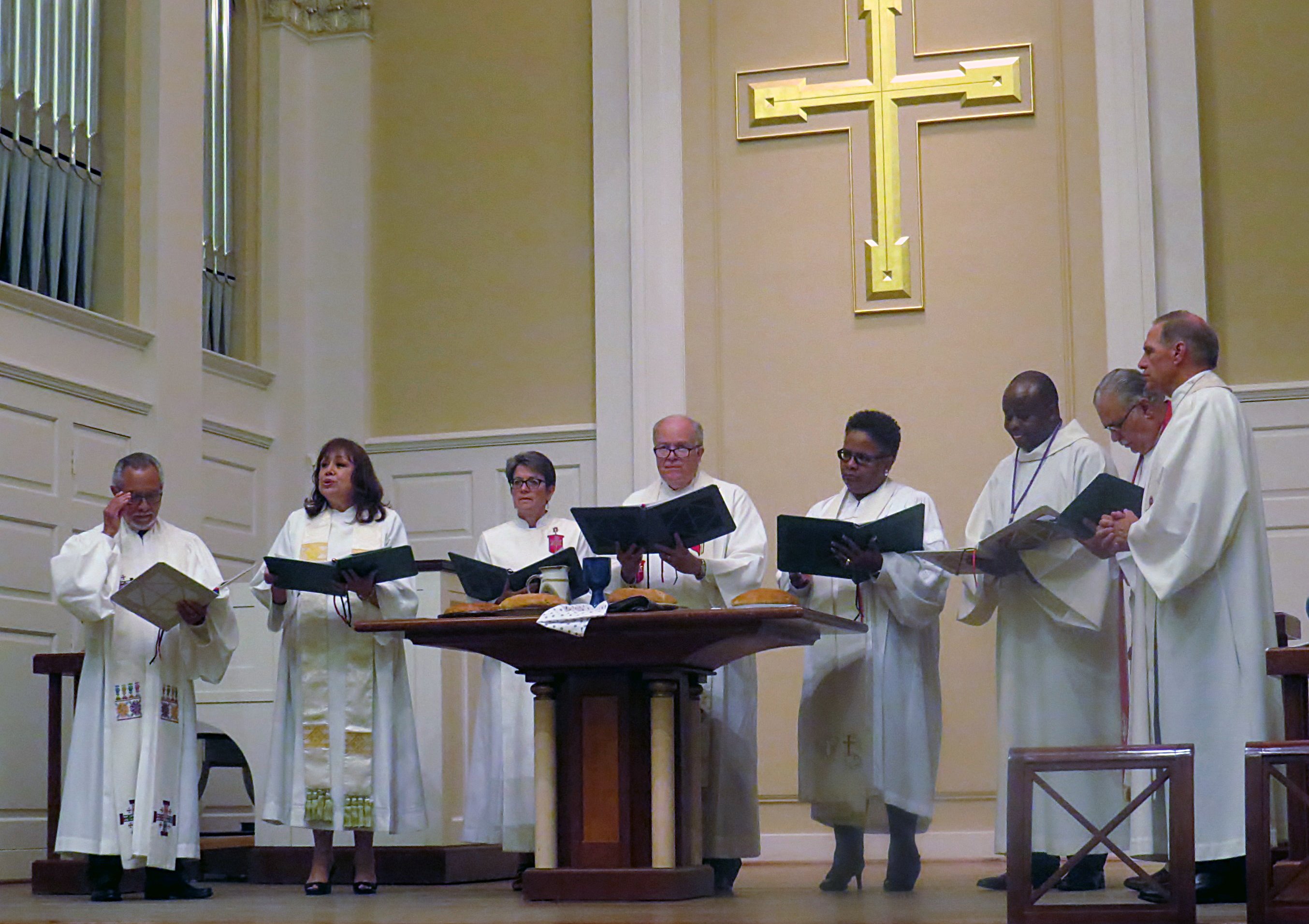 United Methodist bishops gather before offering communion during the Aug. 10 opening worship at the 46th MARCHA Assembly, in Dallas. MARCHA, the Hispanic/Latino caucus of the denomination, met through Aug. 13, holding plenary sessions and workshops in addition to worship. Photo by Sam Hodges, UMNS.