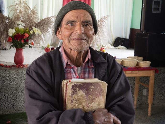 Manuel Ixtan Gerõnimo, a member of the congregation at Iglesia Nacional Methodista Primitiva Fuente De Vida, said he has been planting seeds about Christ’s words from the Bible he has had for 40 years.