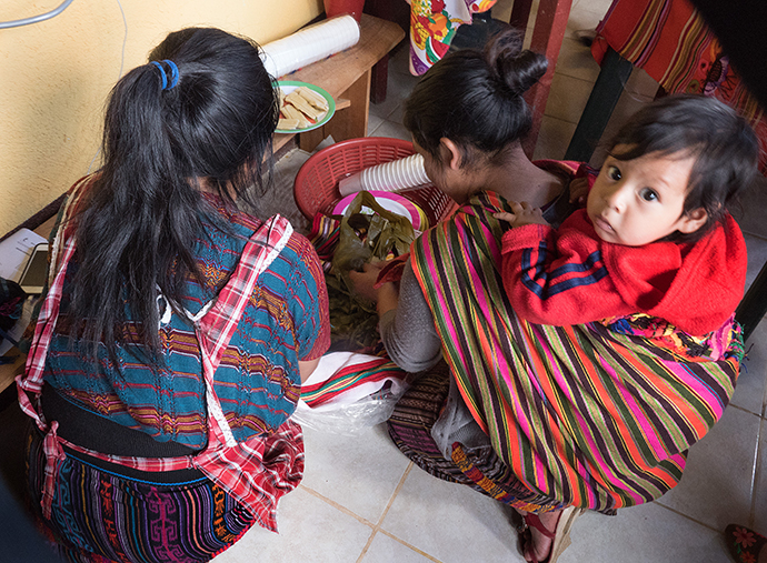 Women from the congregation prepare lunch for church leaders from the United States and neighboring communities.