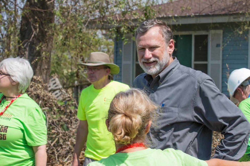 Bishop Robert Schnase of the Rio Texas Annual Conference visited Sept. 1 with community members and relief workers in areas heavily damaged by Hurricane Harvey. Schnase toured churches damaged by the storm, and met with emergency response teams, pastors and homeowners. Photo courtesy of the Rio Texas Conference.