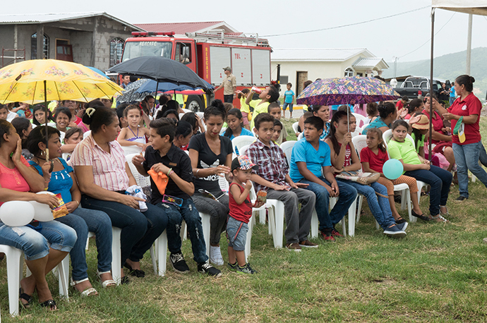 The congregation gathered for the laying of the cornerstone for Casa de Paz United Methodist Church in San Pedro Sula, Honduras. The church has had many challenges to overcome on their journey to build a church. Currently they are meeting in a building that is a former bar. Photo by Kathy L. Gilbert, UMNS.