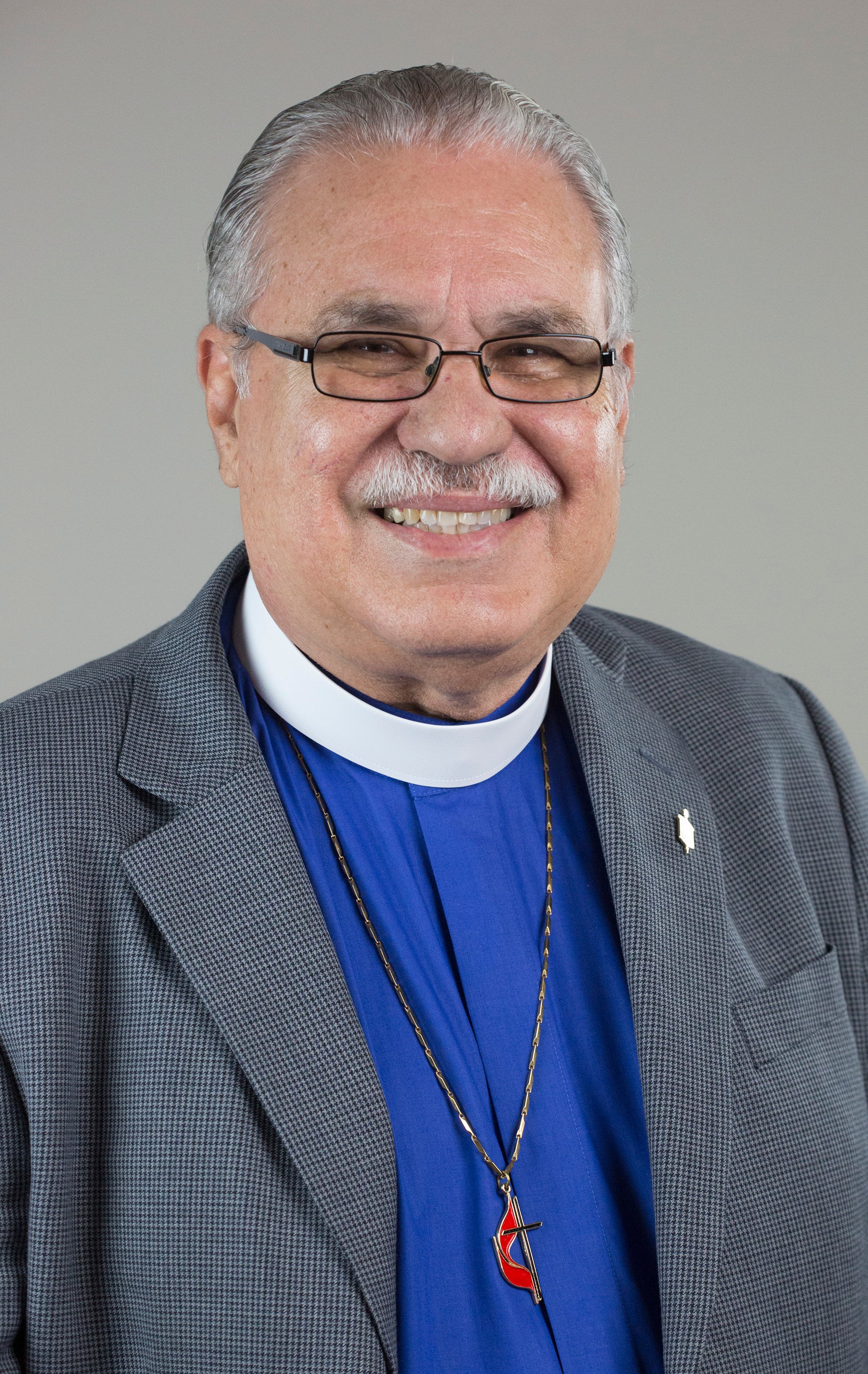 Portrait of Bishop Hector Ortiz by Kathleen Barry, United Methodist Communications.