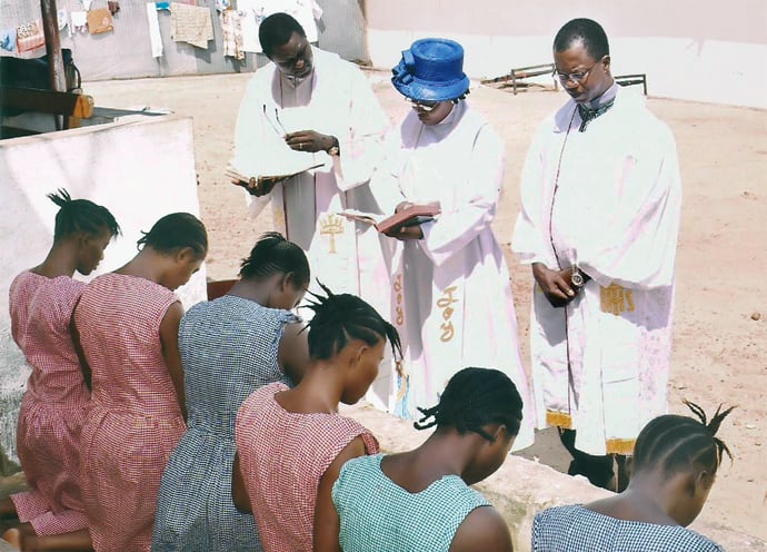 Women take confirmation vows to join The United Methodist Church during the November service at the Female Correctional Center in Freetown, Sierra Leone. Photo by Phileas Jusu, UMNS.