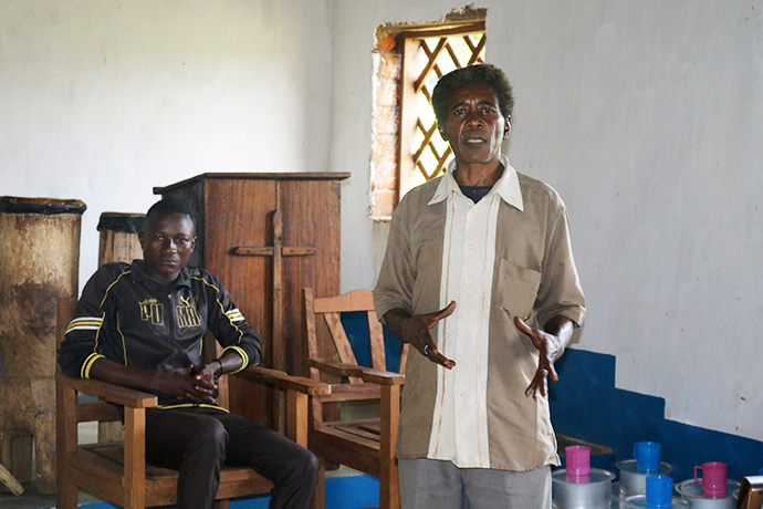 The administrative secretary of the Kasongo-Samba District, Lombe Penekitu, extends his hands in thanks to The United Methodist Church for its help with aid and shelter for those fleeing rebel violence in the Democratic Republic of Congo. Photo by Judith Osongo Yanga, UMNS.