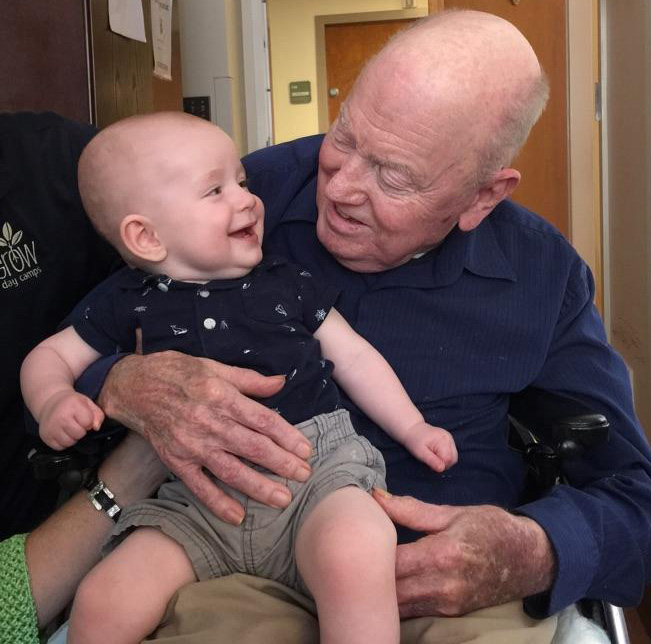 Bishop L. Bevel Jones III holds his great-grandson Eli Jones in this undated file photo. Photo courtesy of the Rev. David Bevel Jones.