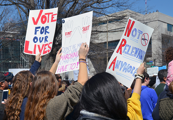 Signs at the March for Our Lives in Washington March 24 send the message that gun laws need to be changed so that people are safe. United Methodists and other faith leaders lent their voices and feet to the cause. Photo by Erik Alsgaard.