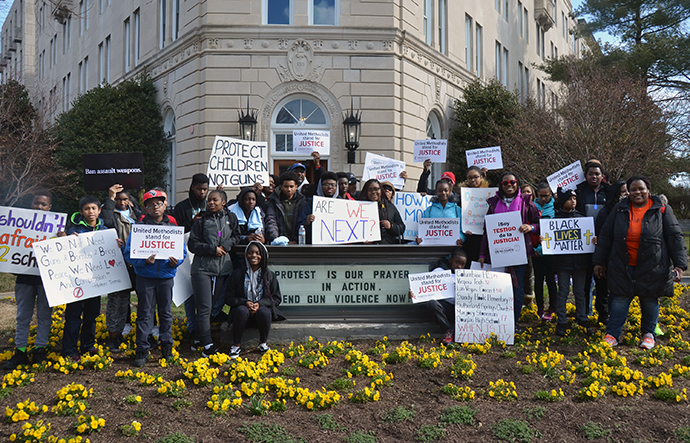 Youth from the Greater Washington District of the Baltimore-Washington Conference, pose outside the United Methodist Building in Washington March 24, before participating in the Walk for Our Lives. Photo by Erik Alsgaard.