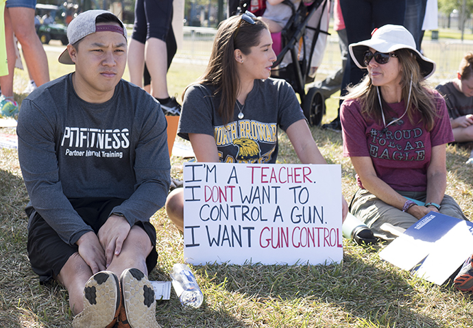 Thousands of supporters came to Pine Lake Park to support students rallying for gun law change. The park is one mile from Marjory Stoneman Douglas High School where 17 people were killed on Feb. 14. Photo by Kathy L. Gilbert, UMNS.