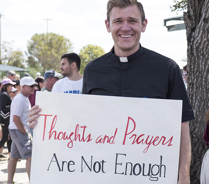 The Rev. Josh Beaty, pastor of discipleship at Christ United Methodist Church, Fort Lauderdale, Fla., was among many United Methodists who participated in the March for Our Lives rally held March 24 in Parkland, Fla. Photo by Kathy L. Gilbert, UMNS.