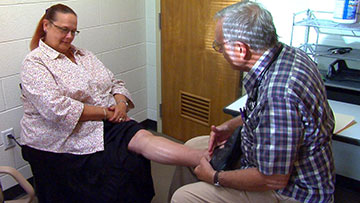 A patient is treated at the Shepherd's Hope medical clinic.