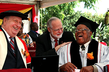 Dr. James Holsinger (center) enjoys a moment with the Rev. John W. Z. Kurewa (right) and the Rev. Roger Ireson before they received honorary Doctor of Letters degrees from Africa University.