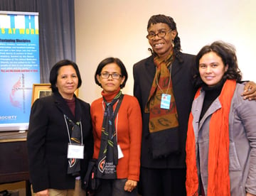 From left, Estrelita Mariano and Teresita Vistro of the Philippines, Nelcia Hazell of St. Vincent in the Caribbean and Ana Chã of Brazil greet each other after a panel discussion at the Church Center for the United Nations.