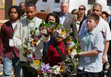 Children lay a wreath at the Civil Rights Memorial in Montgomery during the annual congressional civil rights pilgrimage to Alabama. A UMNS 2009 file photo by Kathy Gilbert.