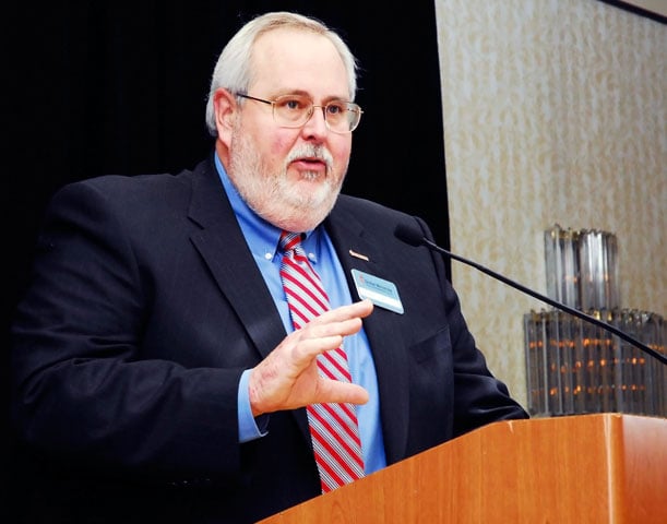 The Rev. Sam Dixon addresses a meeting of the United Methodist Board of Global Ministries in Stamford, Conn., in March 2008. <br/>A UMNS file photo by Cassandra M. Zampini.