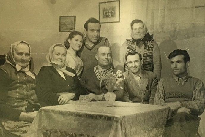 The Rev. Bodijar Popov and his wife Spaska (center back) are surrounded by family and friends in this photo from their wedding day in 1956. Photo courtesy of Bodijar Popov archives. 