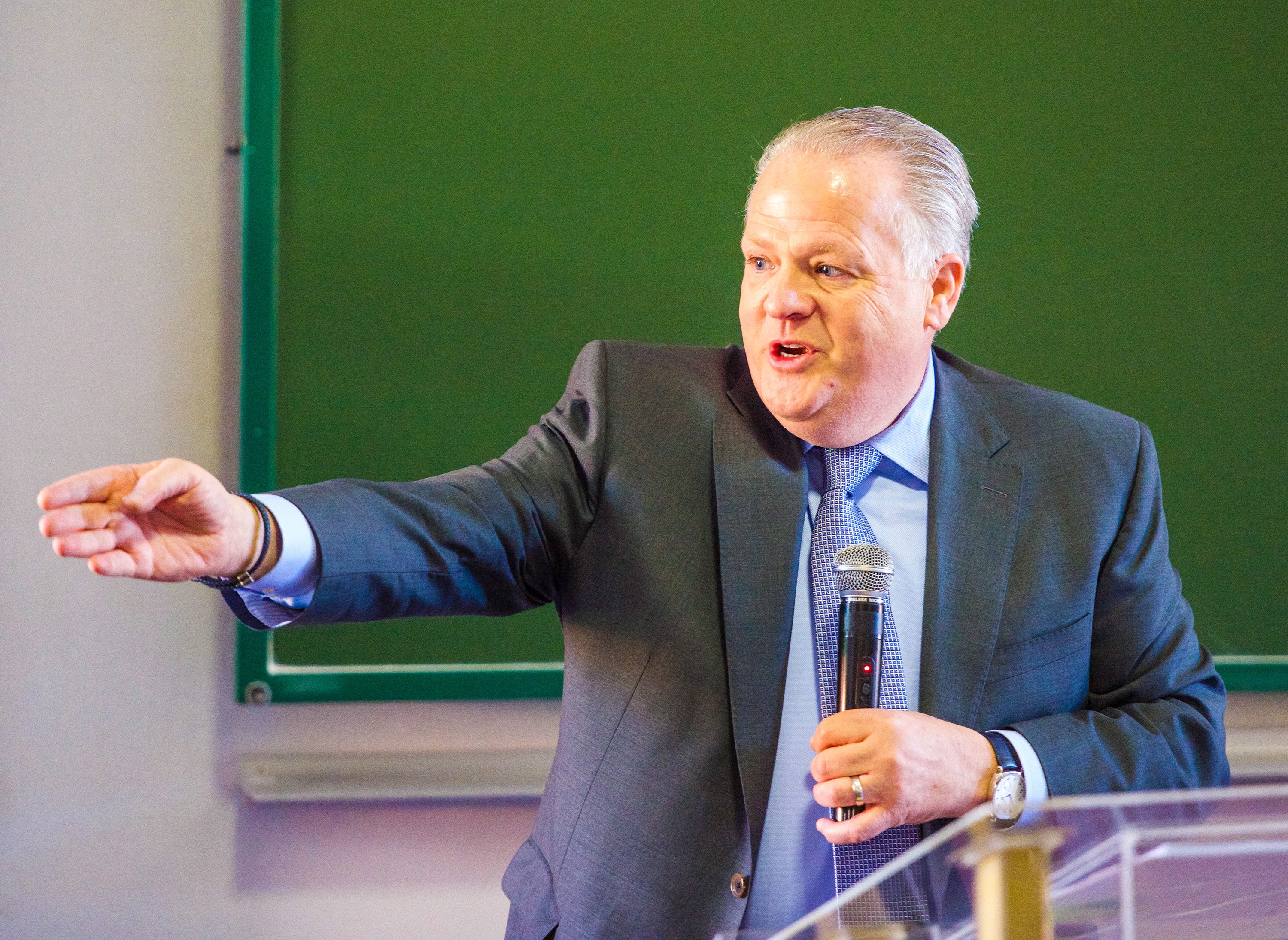 Timothy Keating addresses students at Africa University prior to their graduation. “By working hard and treating people with respect you can improve your luck, someone will take a risk on you,” the Boeing executive said. Photo by the Africa University Department of Information and Public Affairs.