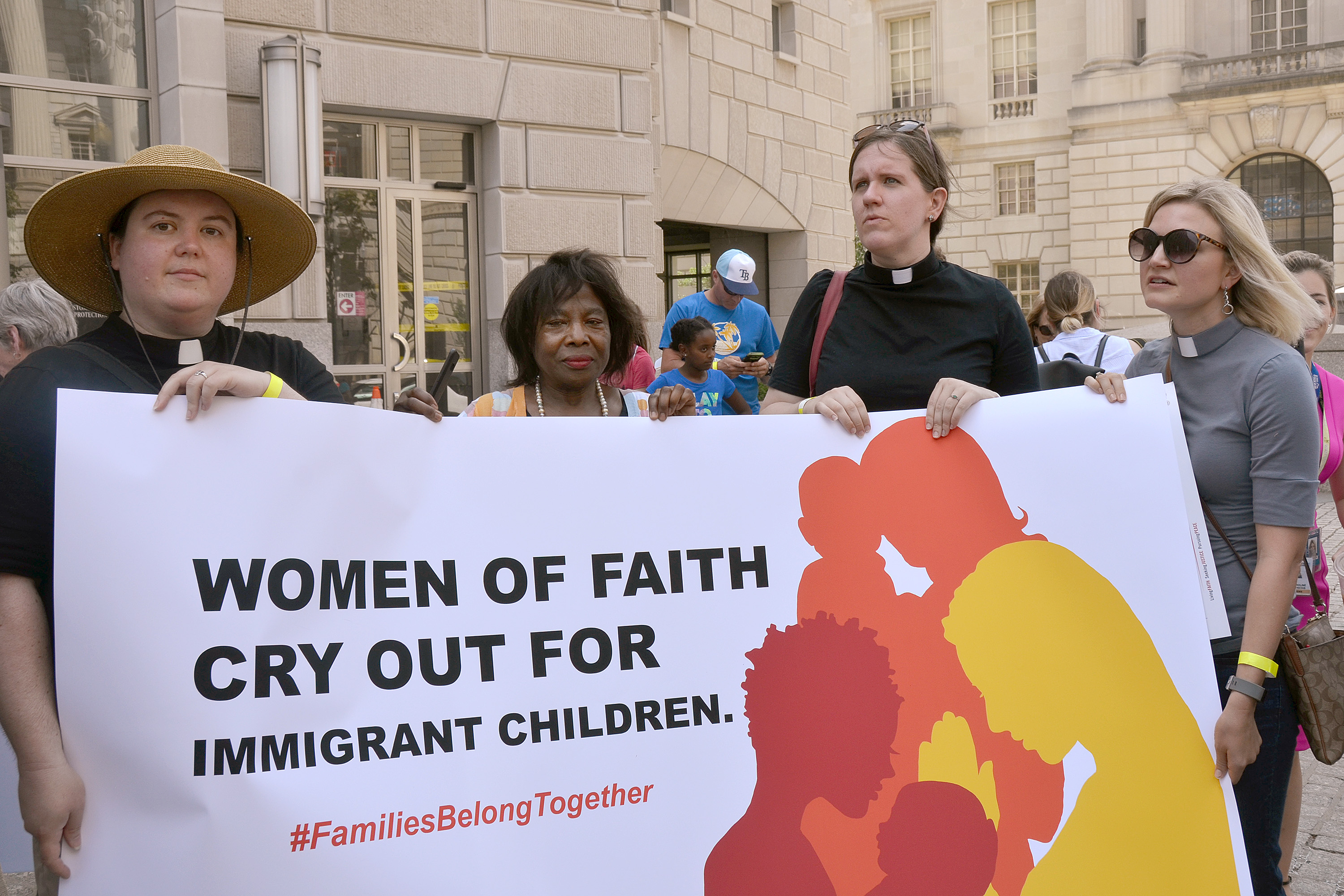 United Methodists join a rally outside the U.S. Customs and Border Protection offices in Washington. From left are: the Rev. Sarah Harrison-McQueen; Susie Johnson, director of public policy for United Methodist Women in Washington; and the Revs. Allie Rosner-Bass and Kate Floyd. Photo by Erik Alsgaard, UMNS.