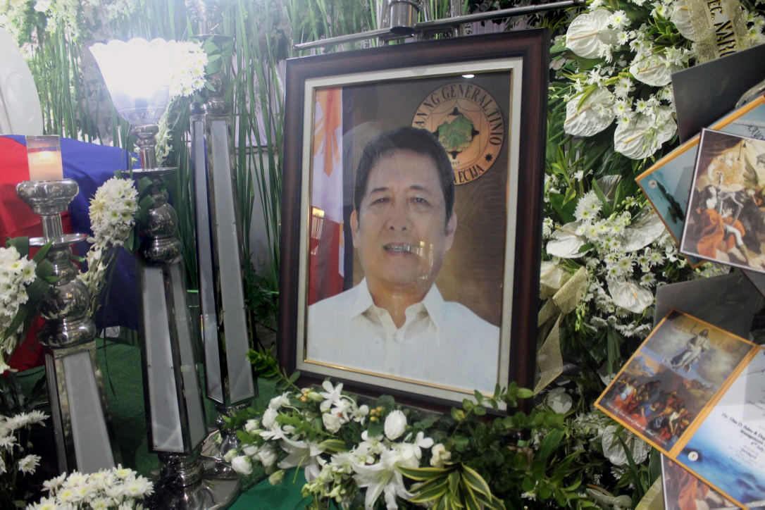 A photo of slain mayor Ferdinand Bote is displayed at a wake in his honor at the Sports Center Municipal Hall, General Tinio, Nueva Ecija. Bote was the second town mayor in the Philippines who was shot and killed by an unknown assailant in two days. Photo by Gladys Mangiduyos, UMNS.