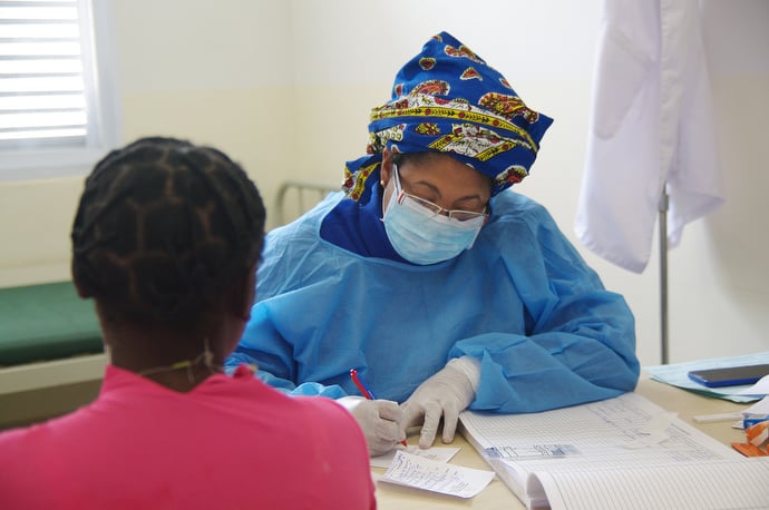 Doctors Celma Antonio (left) and Cleyvis Benítez visit people in the community after offering a clinic at the Quessua Health Center. Photo by the Rev. Gustavo Vasquez, UMNS.