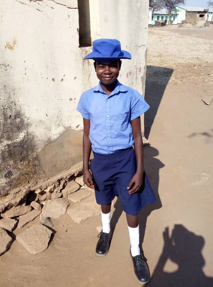 Kupakwashe Kapiso, 14, is one of the beneficiaries of a new scholarship program for orphans in the Harare West District. The money paid for her school fees and uniform. Photo by Chenayi Kumuterera.