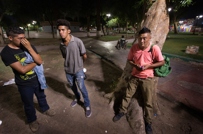 Migrants who have recently arrived from Honduras are among those who were offered a meal and prayer service by the Methodist Church of Mexico at Mariachi Plaza in Mexicali. Photo by Mike DuBose, UMNS.