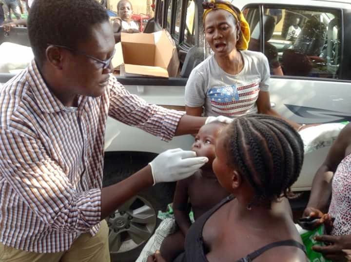 Dr. Godfrey Ogbu provides medical care for patients who were displaced by fighting at a camp for displaced people in Numan. Photo by Ande Emmanuel.