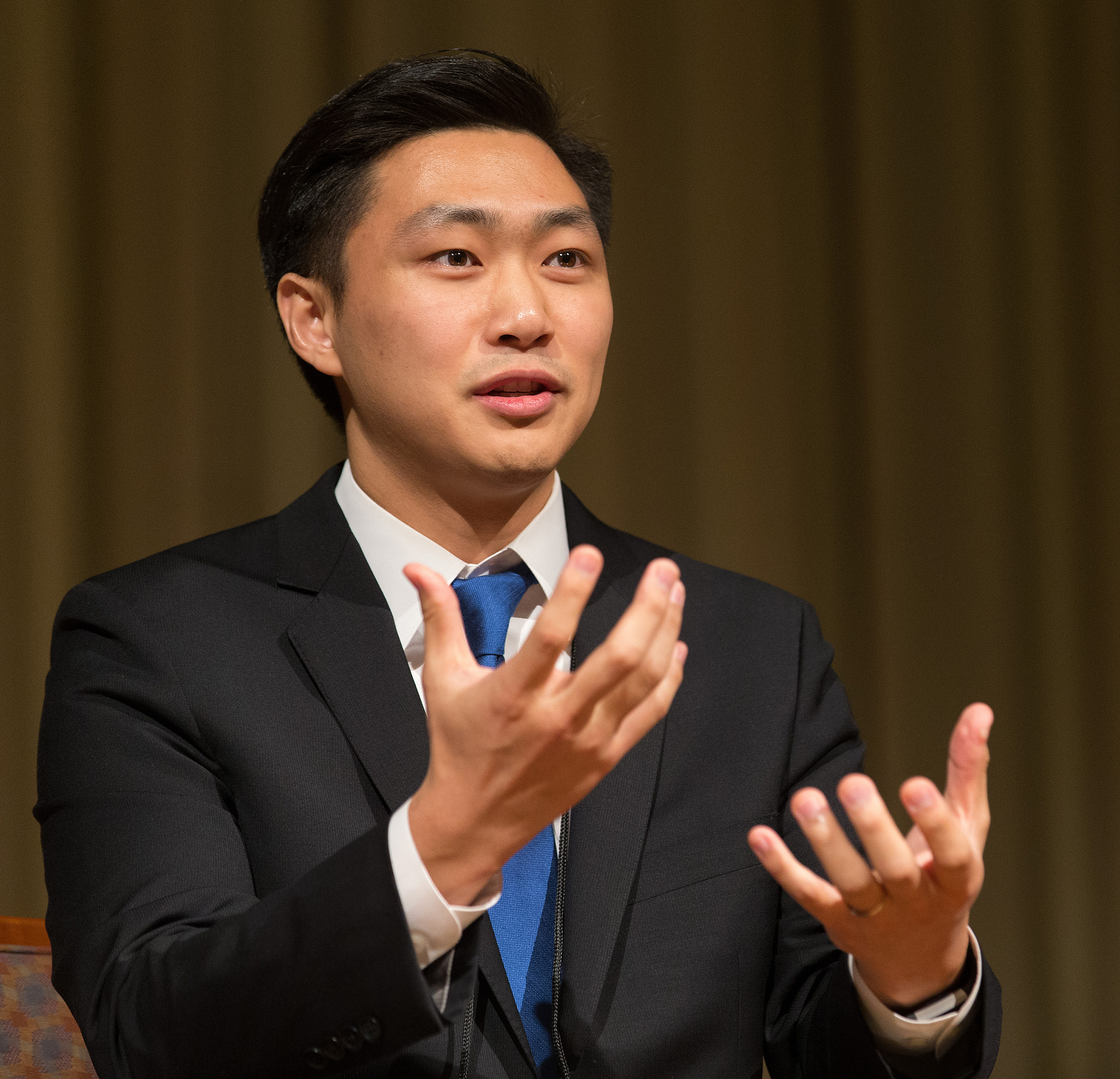 Jongdae Kim takes part in a panel discussion during the Roundtable for Peace on the Korean Peninsula in Atlanta. Kim is executive director of the Re'Generation Movement, which offers free college testing preparation classes and college counseling and hosts conversations on social integration. Photo by Mike DuBose, UMNS.