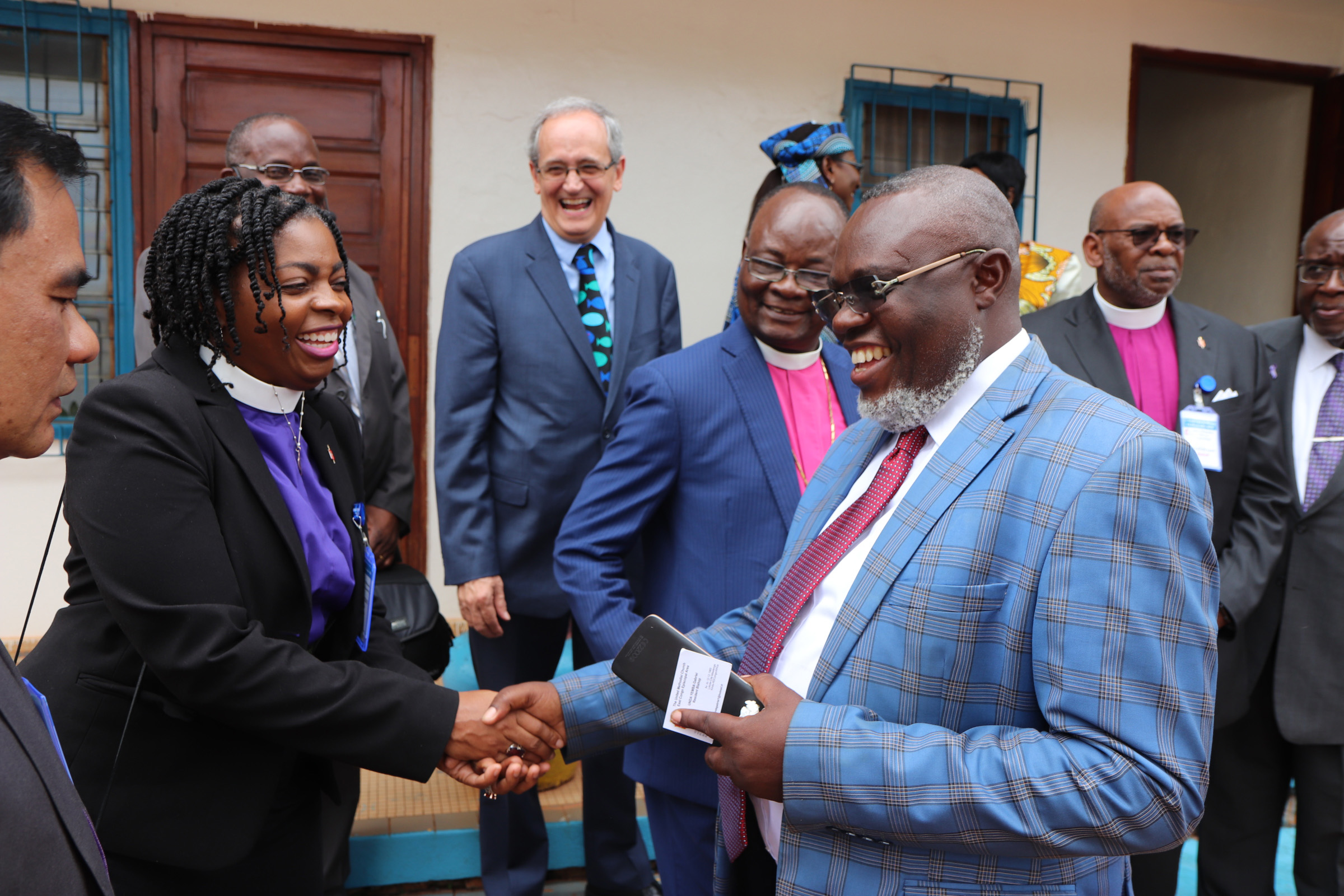 Western Pennsylvania Bishop Cynthia Moore-Koikoi shakes hands with an ambassador from the Democratic Republic of Congo during a November mission trip to the Central Africa Republic. Photo by E Julu Swen, UMNS.