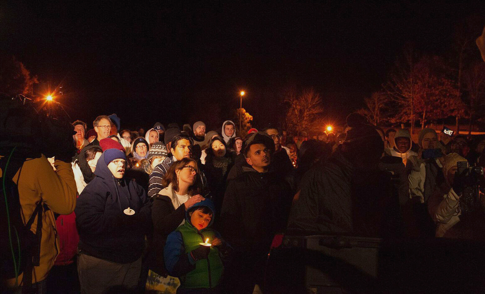 People gather for a prayer service for Samuel Oliver-Bruno outside the Cary, N.C., ICE office on Nov. 27. Photo by Anna Carson Dewitt, courtesy of CityWell United Methodist Church.