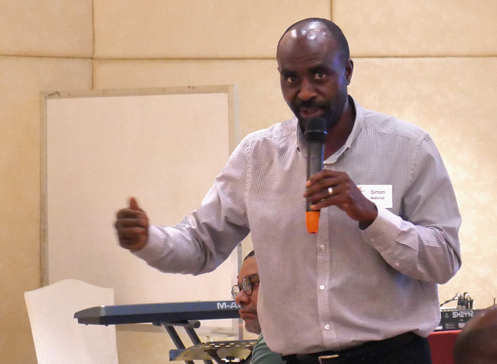 Simon Mafunda of Harare, Zimbabwe, addresses fellow Standing Committee on Central Conference Matters. After the special General Conference, he said he has heard from Africans who feel like “they are being treated like perpetrators.” Photo by Heather Hahn, UMNS.