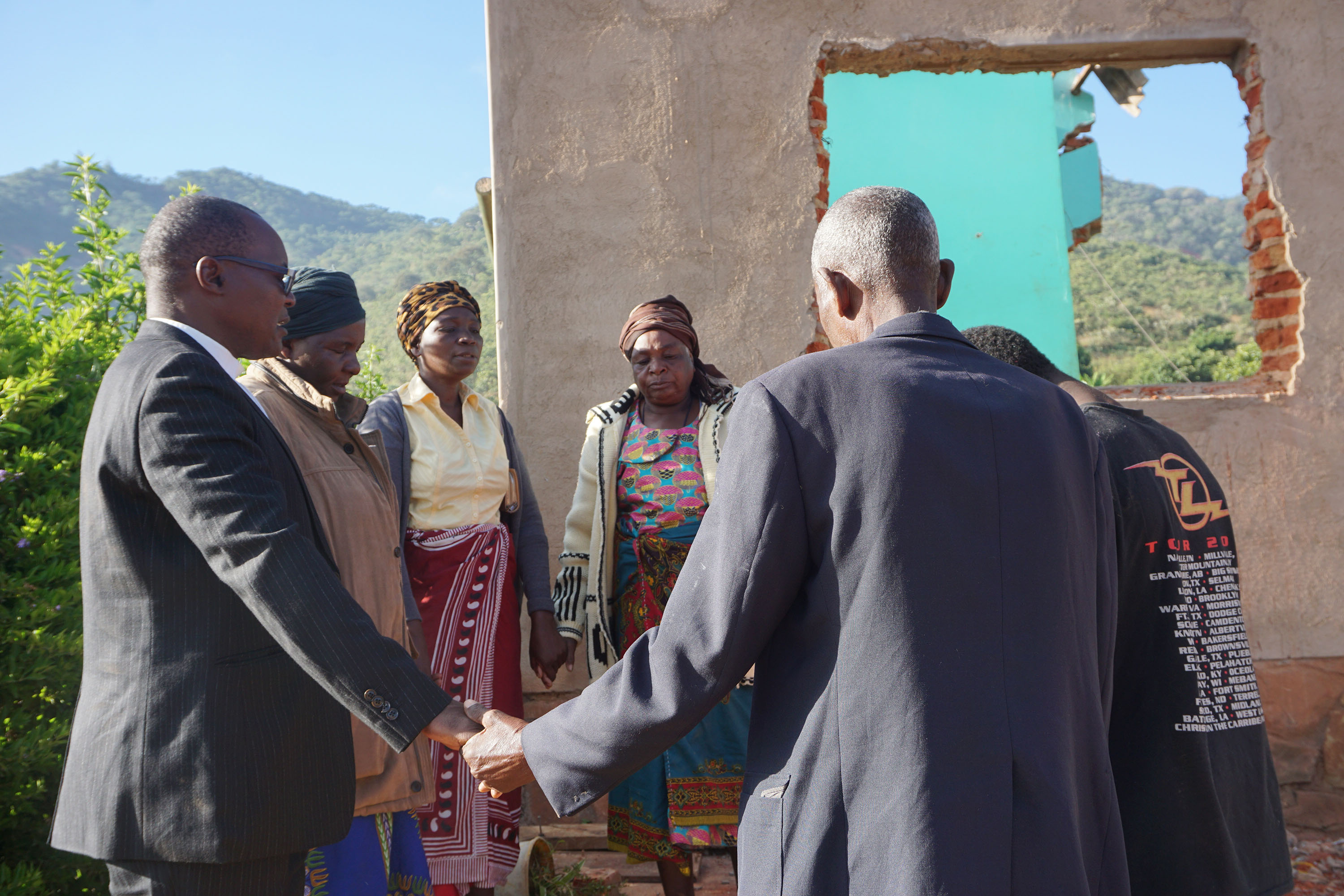 Church members join together in prayer and support for survivors in Ngangu, Zimbabwe. Photo by Kudzai Chingwe, UMNS.