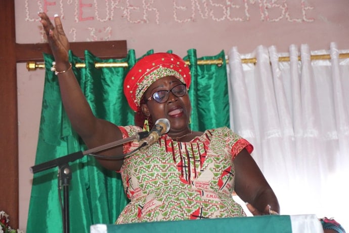 The Rev. Rosalie Nzie of Blessing United Methodist Church in Yaounde helps lead worship. Photo by Isaac Broune, UM News.  