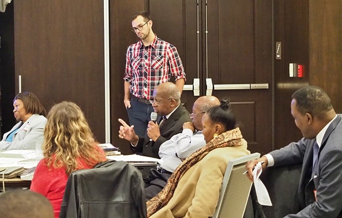 Members of Asbury and Foundry United Methodist churches as well as John Wesley AME Zion Church join together for a class on the legacy of Howard Thurman, theologian and civil rights pioneer. Standing is the Rev. Will Ed Green, who now convenes conversations among the three churches. Photo by Phil Carney, Foundry United Methodist Church.