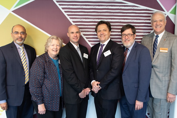 Those supporting the initiation of the asylum seekers project are, from left, Roland Fernandes, United Methodist Committee on Relief; Mary Fitz-Simmons and Rob Rutland-Brown, National Justice for Our Neighbors;  Erol Kekic, Church World Service; and the Rev. Jack Amick and Bishop Thomas J. Bickerton, UMCOR. Photo by Anthony Trueheart, Global Ministries. 