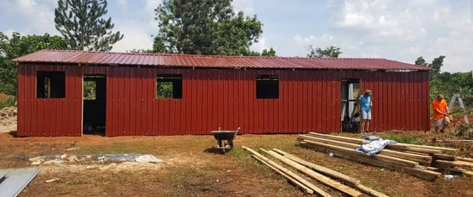 Members of Lynn Haven United Methodist Church in Panama City, Florida, help construct a new church building in Nabilumba, Uganda. Photo courtesy of the Rev. Isaac Kyambadde. 