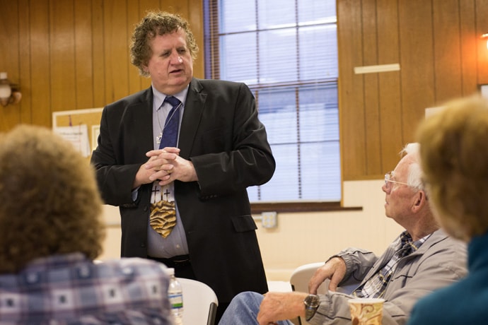 The Rev. Jamie Sprague helps conduct a business meeting at Kanawha Chapel United Methodist Church in Davisville, W.Va. Photo by Mike DuBose, UMNS.