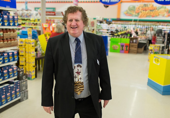 The Rev. Jamie Sprague greets customers at a Kroger store in Parkersburg, W.Va., where he served as manager. Photo by Mike DuBose, UMNS.